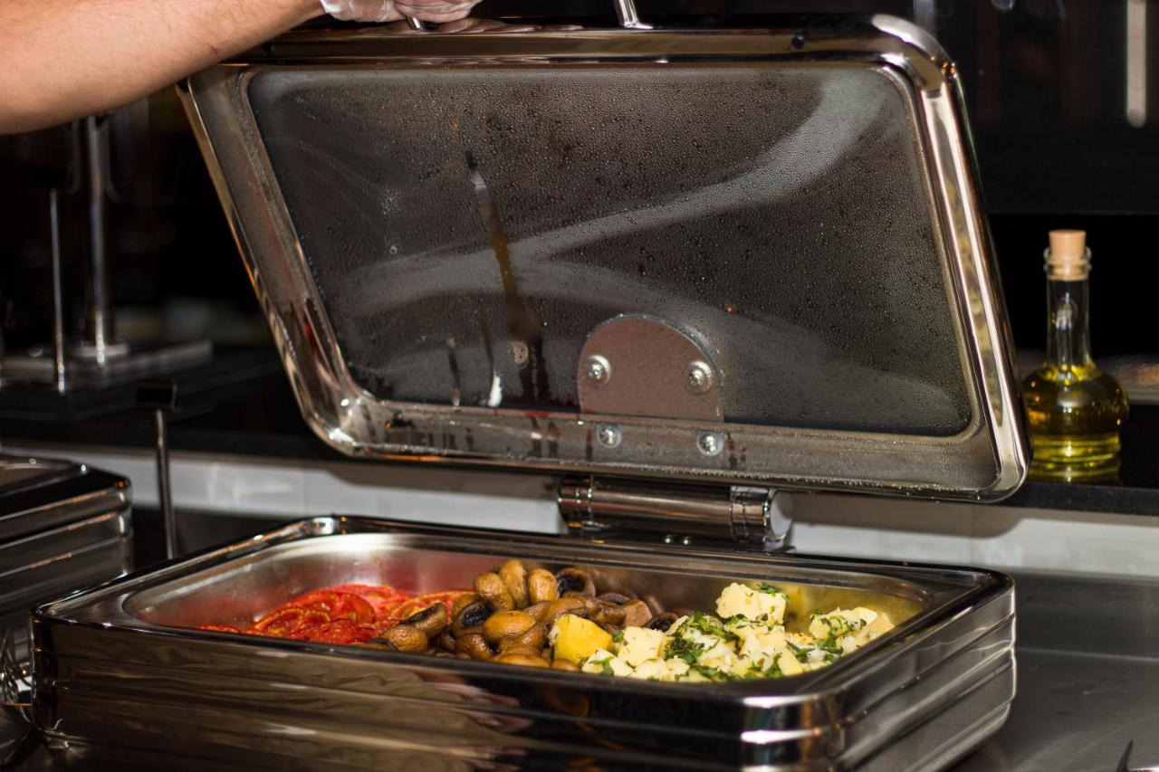 Alliance Palace Batumi Exterior photo A chafing dish