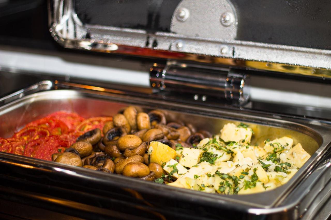 Alliance Palace Batumi Exterior photo A chafing dish