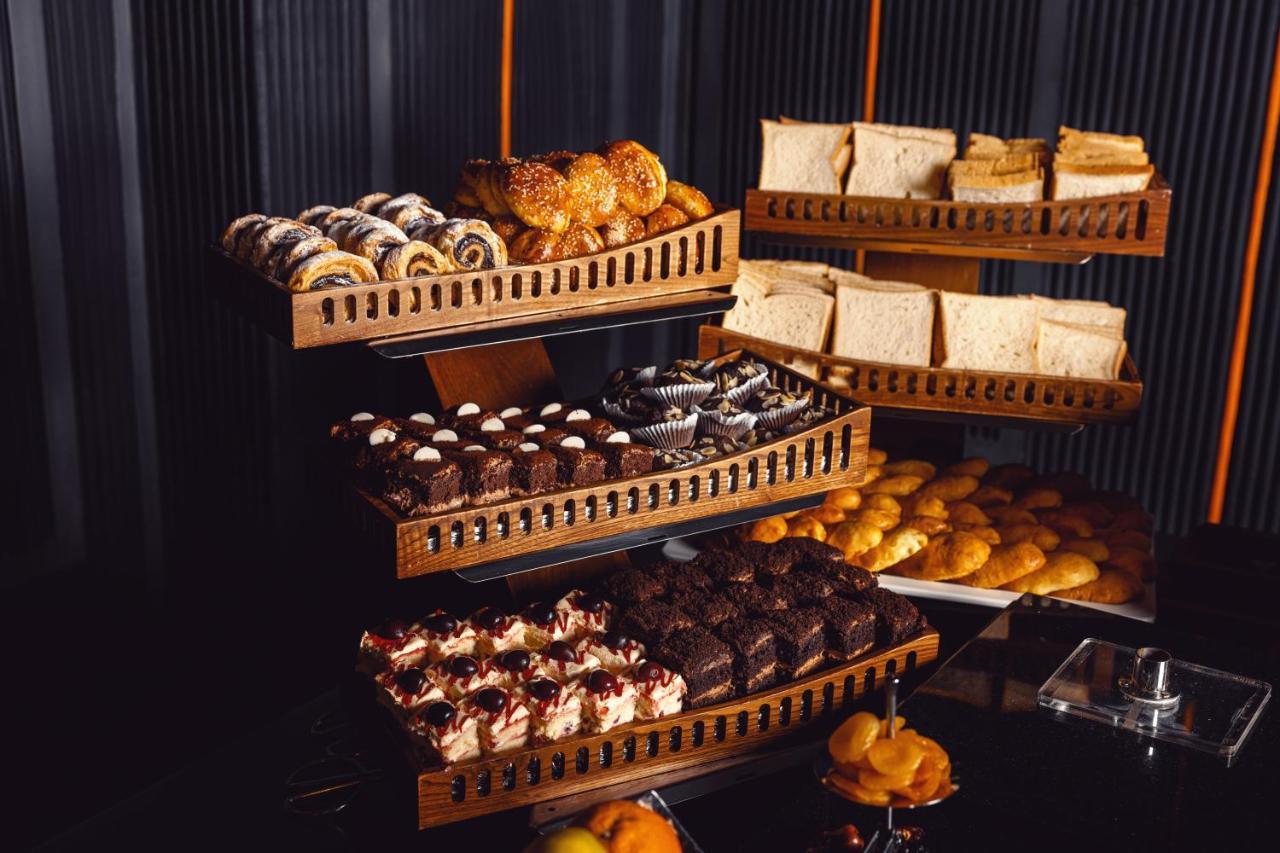 Alliance Palace Batumi Exterior photo A dessert buffet