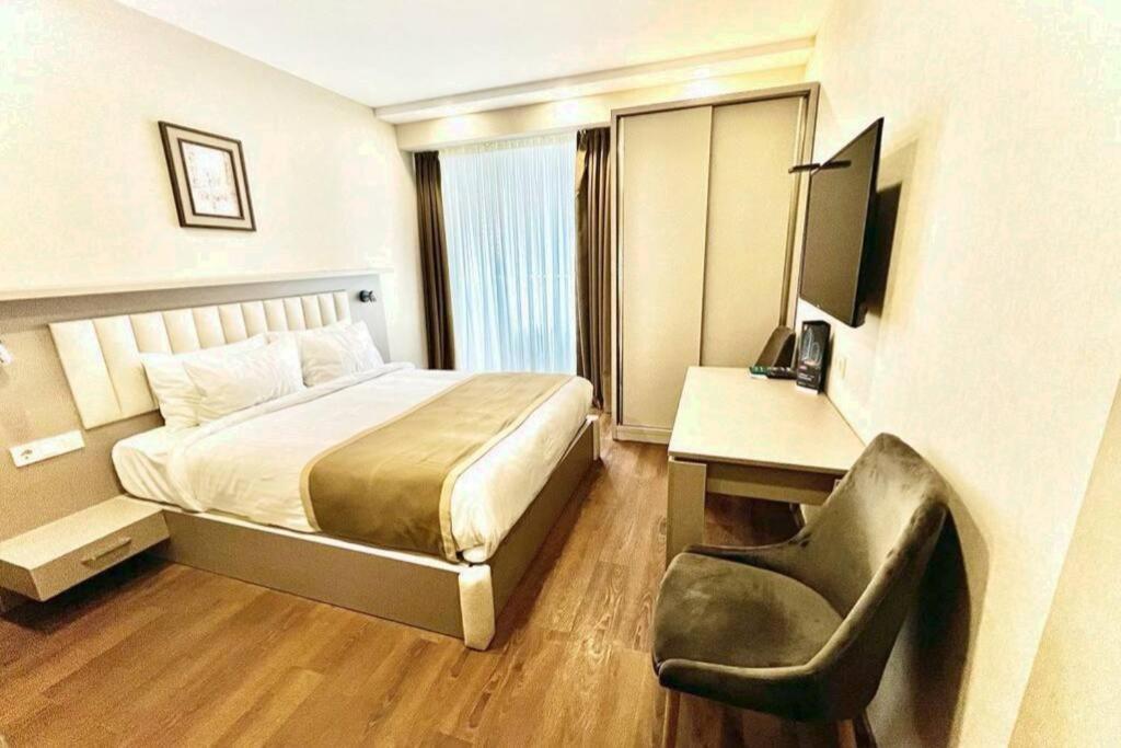 Alliance Palace Batumi Exterior photo A room at the hotel