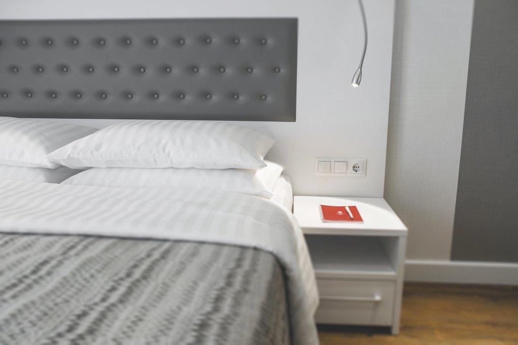 Alliance Palace Batumi Exterior photo A bedside table