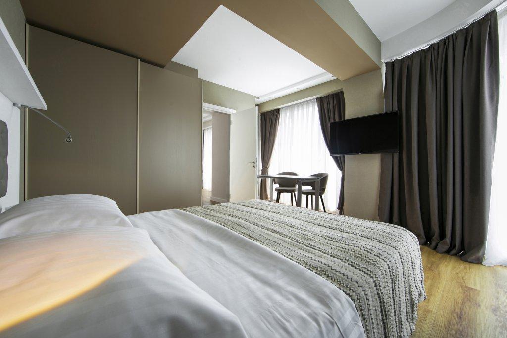 Alliance Palace Batumi Exterior photo A room at the hotel