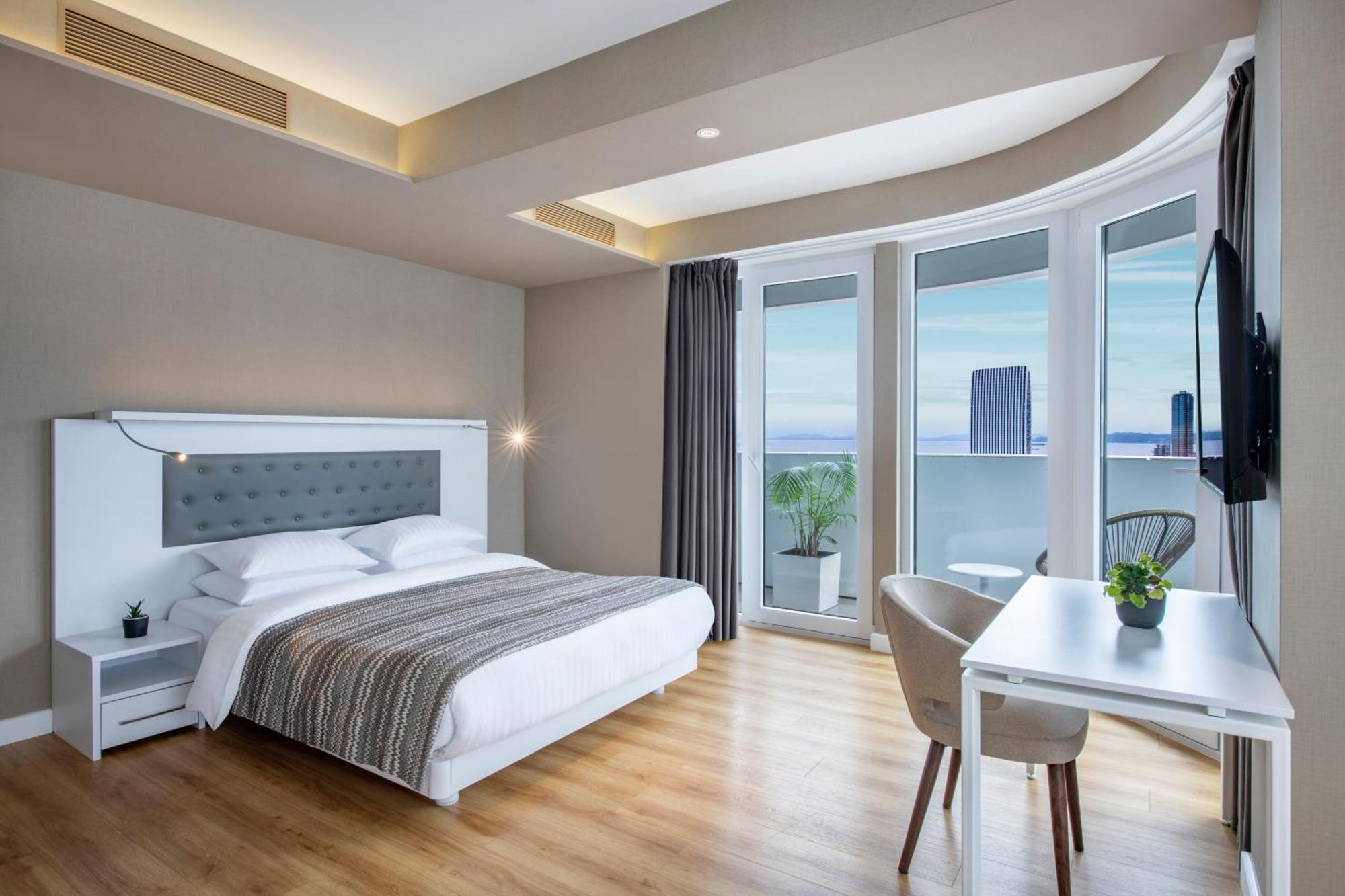 Alliance Palace Batumi Exterior photo A room at the hotel